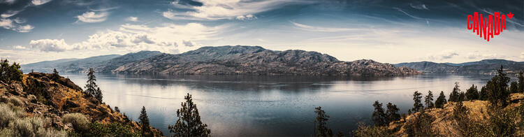 Panorama Lake Okanagan, Visit Canada Logo in der rechten oberen Ecke