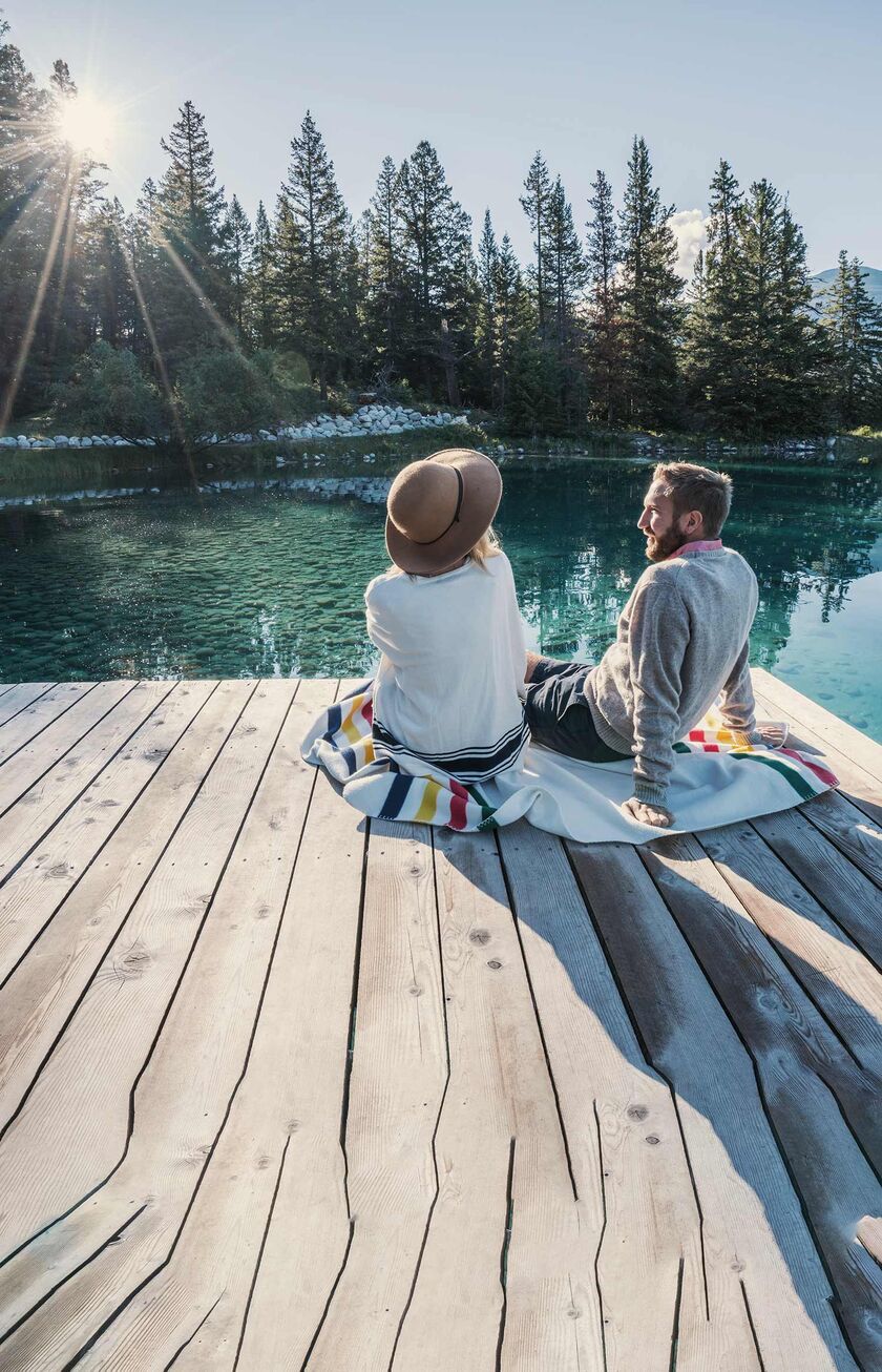 Couple enjoying the views of the lakes and nature in Canada.