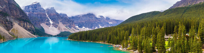 Mountain massif and turquoise lake in the Canadian wilderness