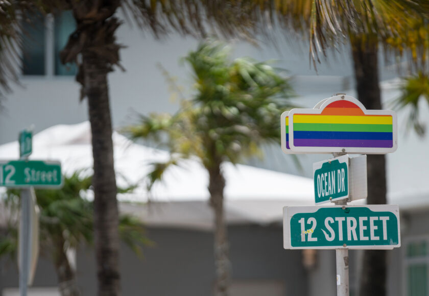 Miami Ocean Drive sign with the rainbow flag