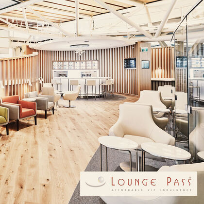 An airport lounge with bright interior is displayed here, including the logo of the partner lounge pass in the front.