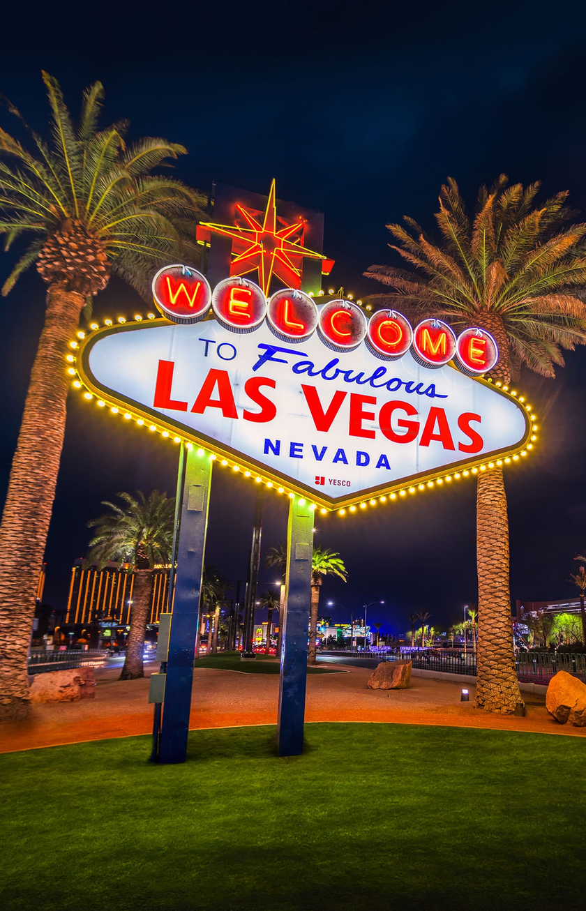 Welcome sign of Las Vegas; blue sky and palm trees
