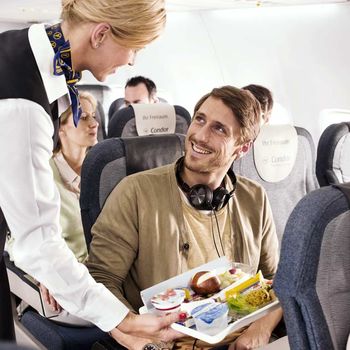 Stewardess serving food