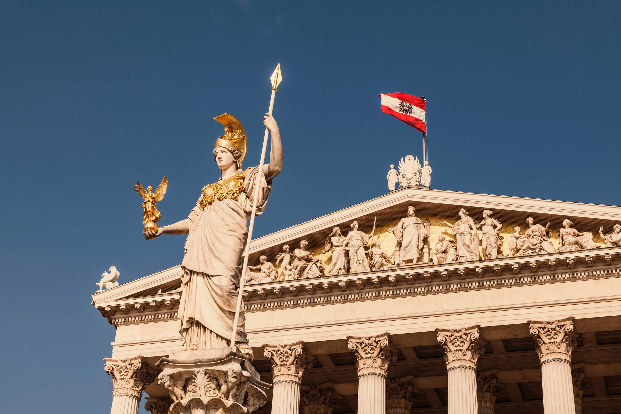 Austria, Vienna, Parliament, National and Federal Council, statue of the goddess Pallas Athena, Austrian flag