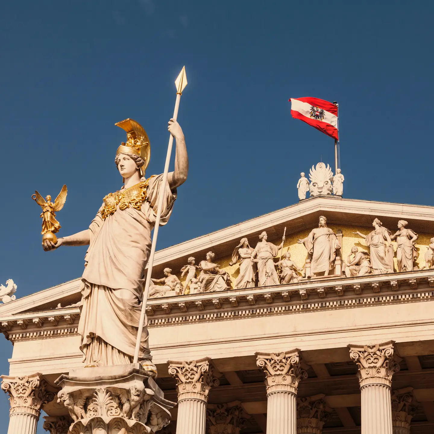 Austria, Vienna, Parliament, National and Federal Council, statue of the goddess Pallas Athena, Austrian flag