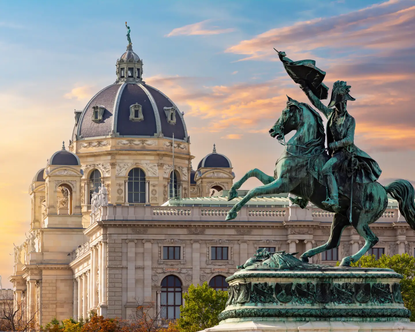 The Kunsthistorisches Museum and the Maria Theresa Monument in the center of Vienna at sunset.