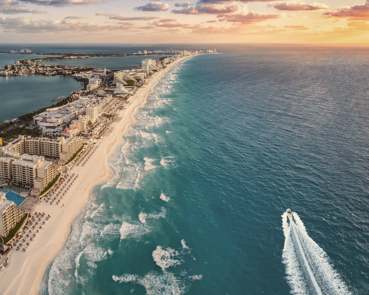 birdview of the coastline with hotels and buildings of punta norte