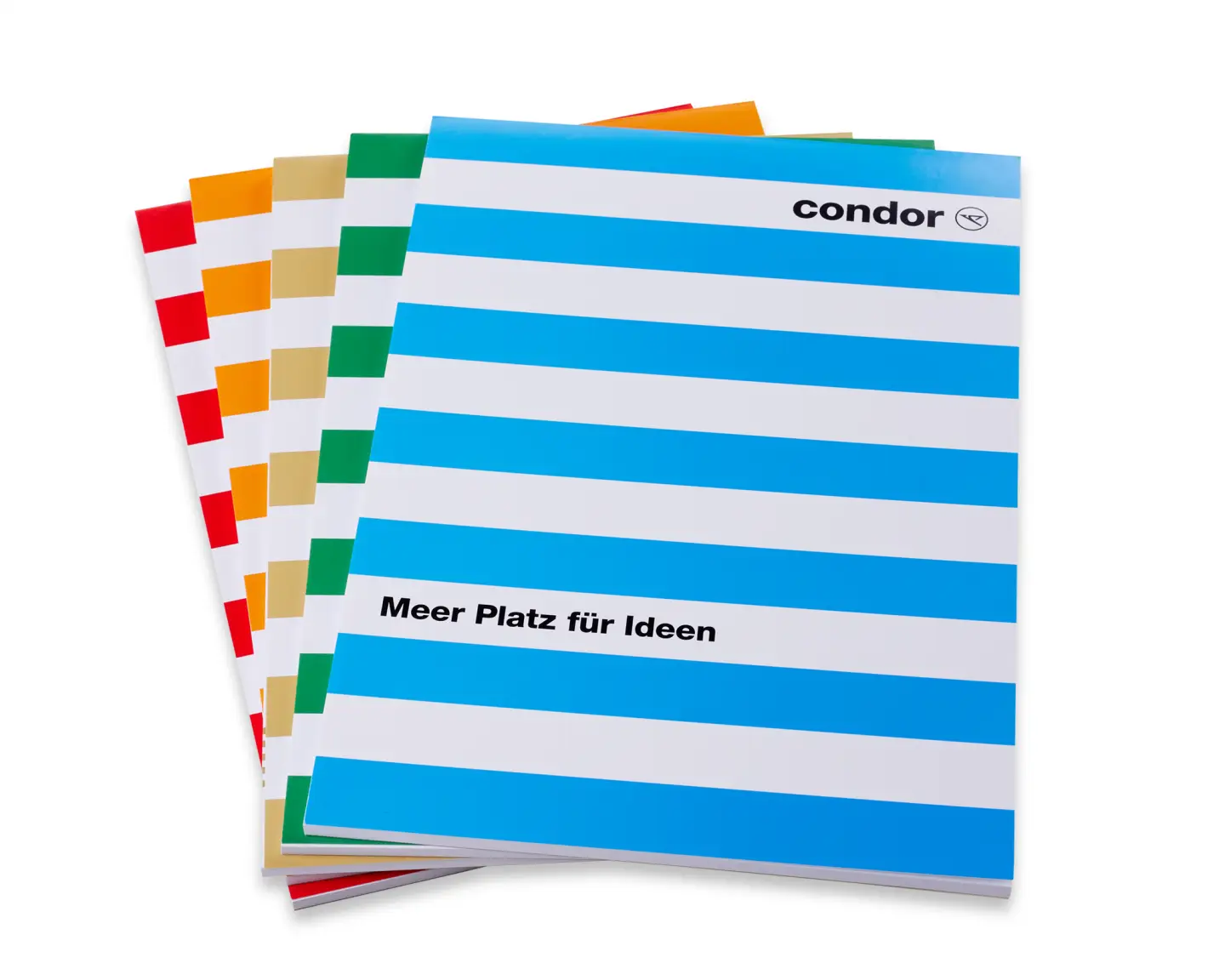 Fünf übereinander liegende Schreibblöcke in den fünf Farben des Condor Streifen Looks. Sunshine (Gelb), Passion (Rot), Sea (Blau), Island (Grün) und Beach (Beige).