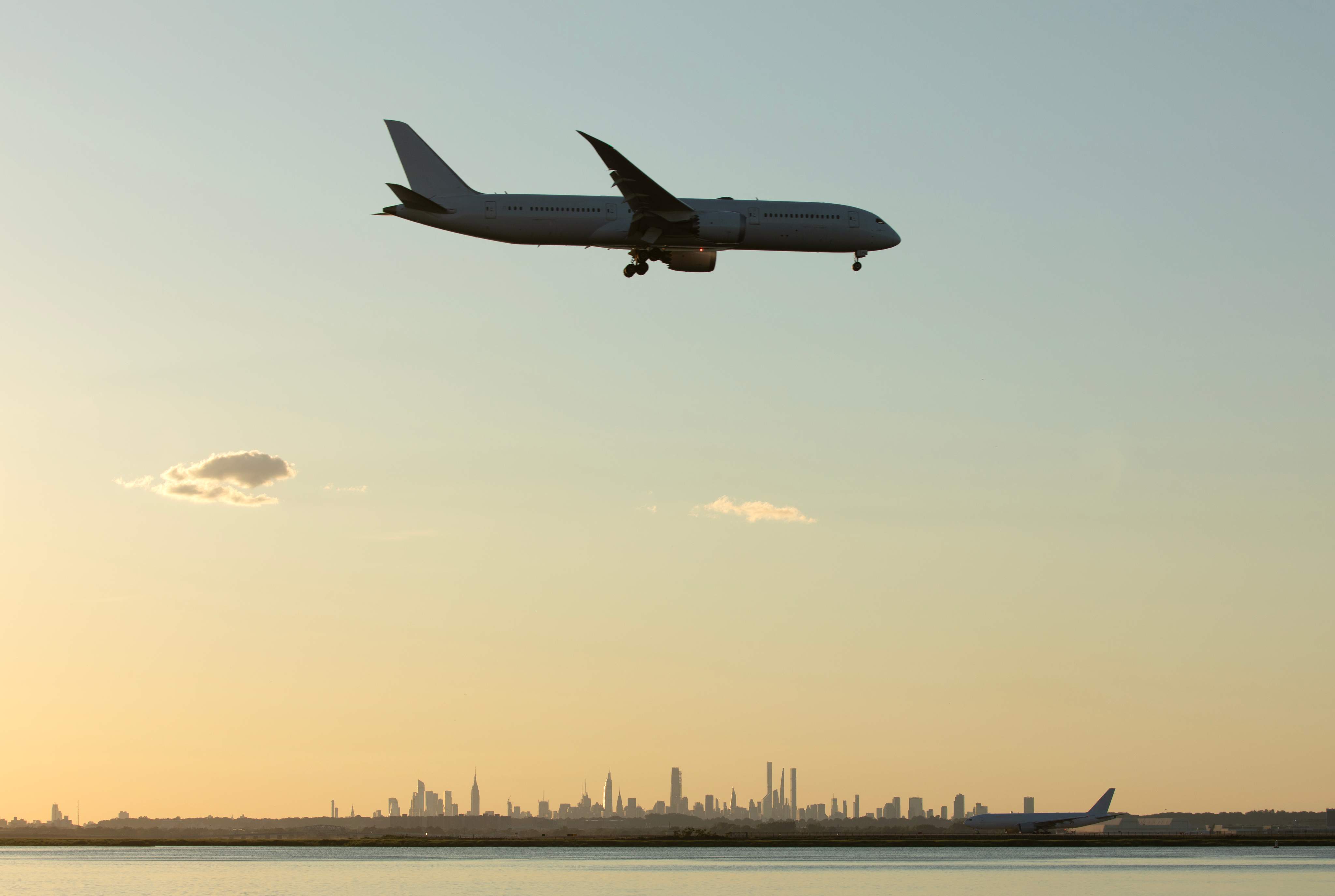 Commercial airplane landing at Kennedy Airport in New York City.