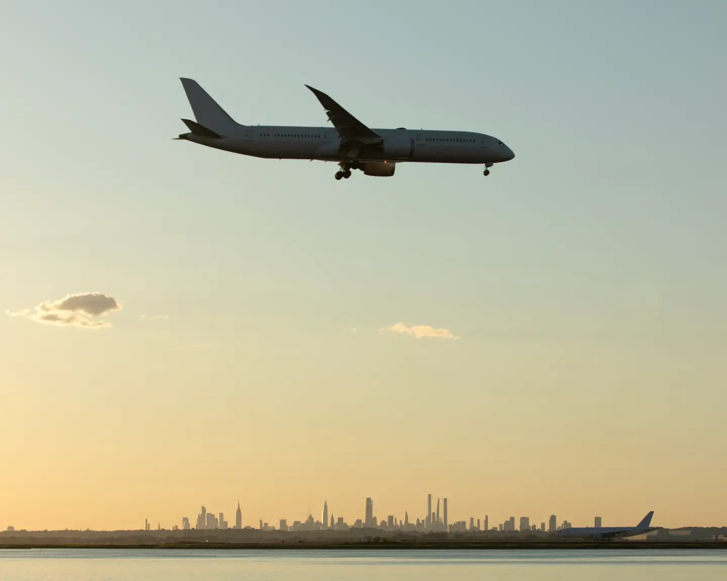 Commercial airplane landing at Kennedy Airport in New York City.