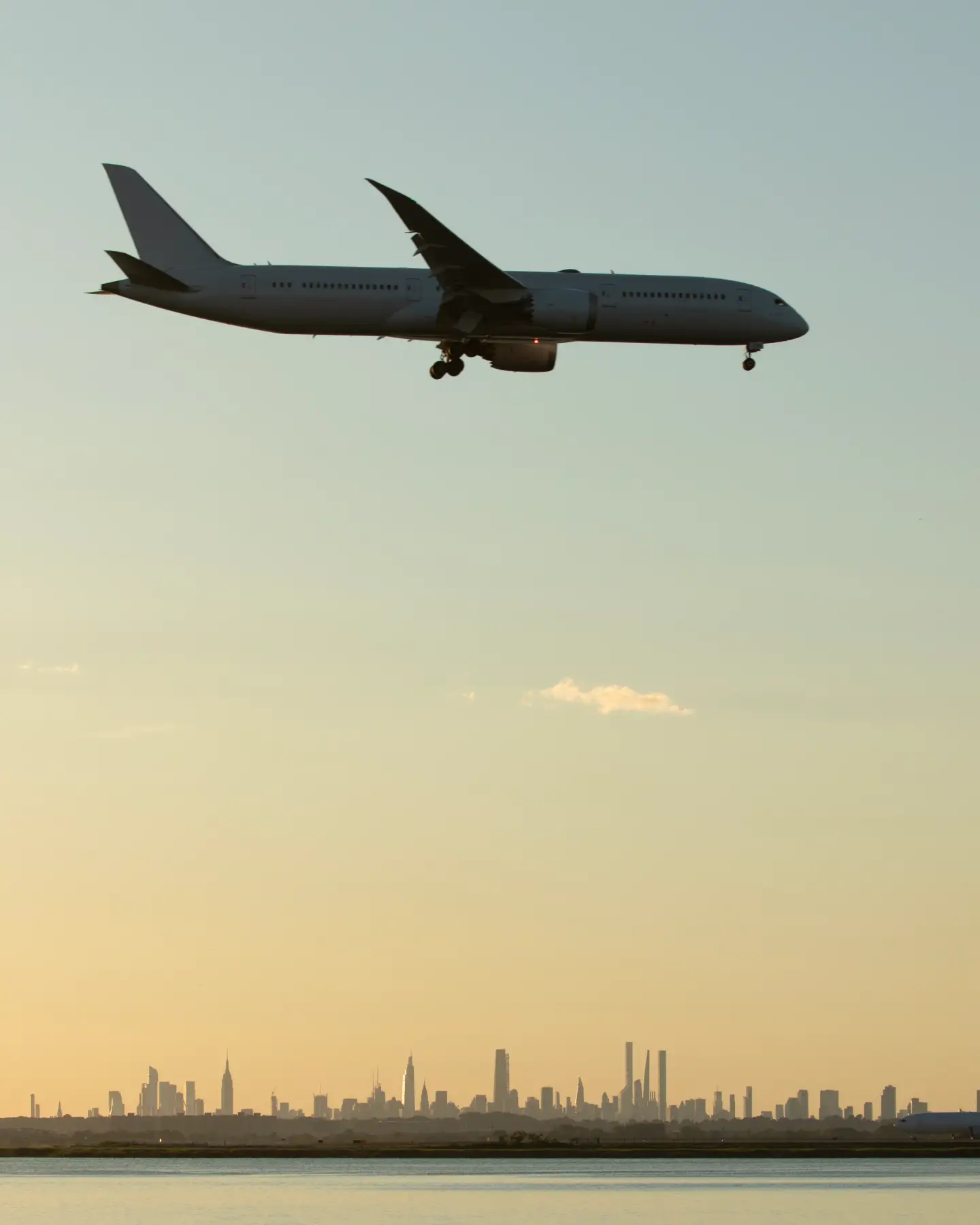 Commercial airplane landing at Kennedy Airport in New York City.
