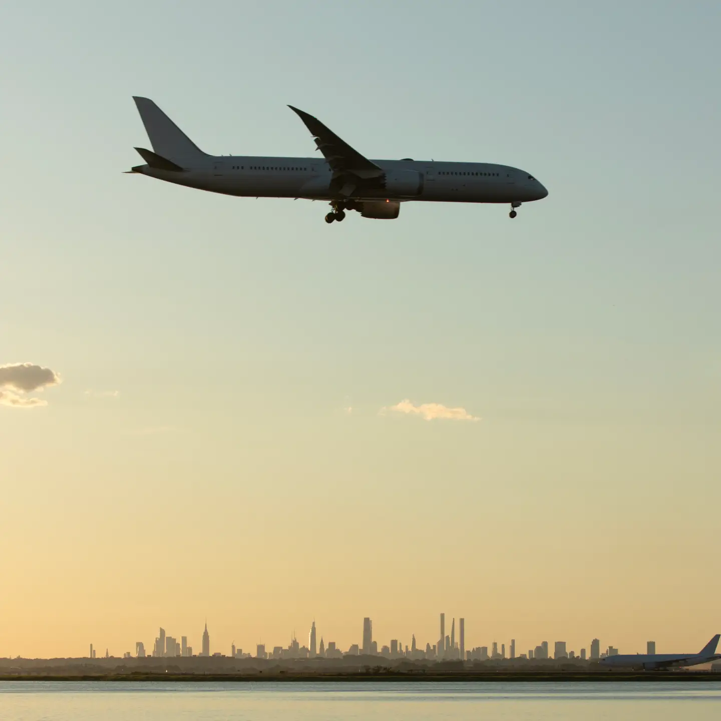 Commercial airplane landing at Kennedy Airport in New York City.