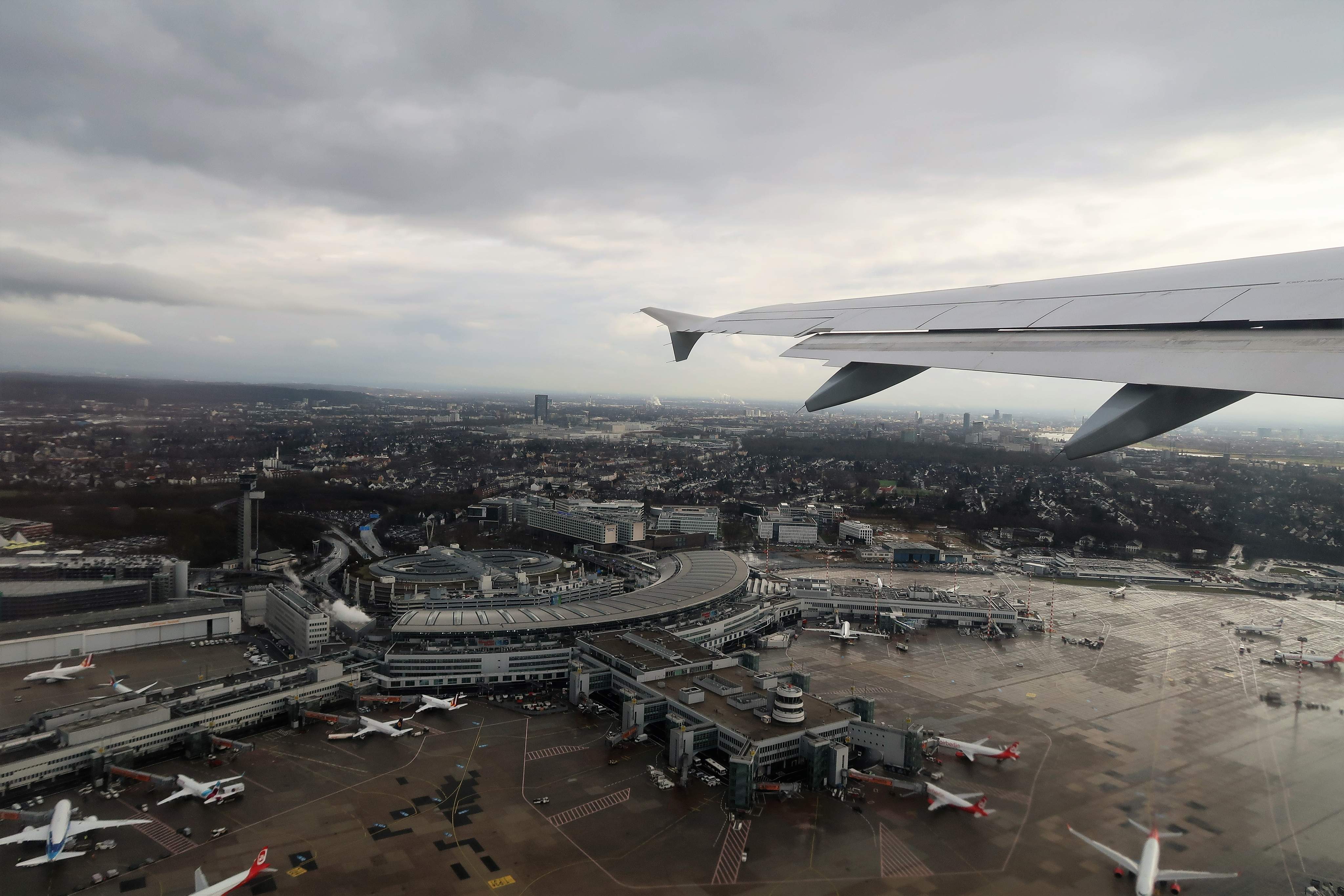 Düsseldorf, Germany – March 01, 2017: photography showing the cityscape of Düsseldorf from the sky. The photography was taken during take off from the inside of a commercial airplane that just took off from Düsseldorf international aeroport to go to Geneva airport in Switzerland.