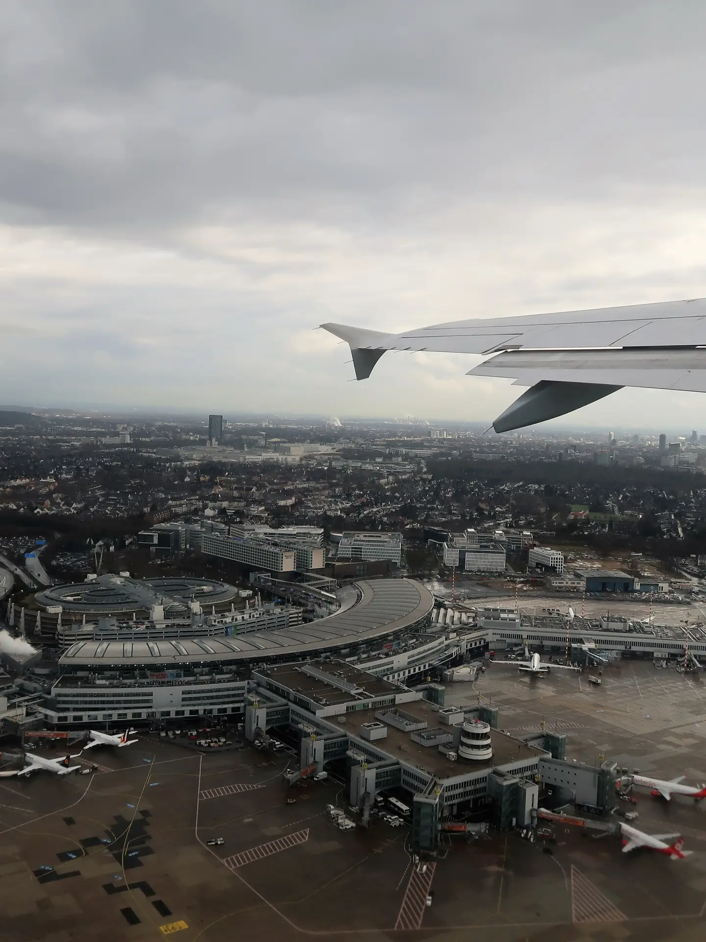 Düsseldorf, Germany – March 01, 2017: photography showing the cityscape of Düsseldorf from the sky. The photography was taken during take off from the inside of a commercial airplane that just took off from Düsseldorf international aeroport to go to Geneva airport in Switzerland.