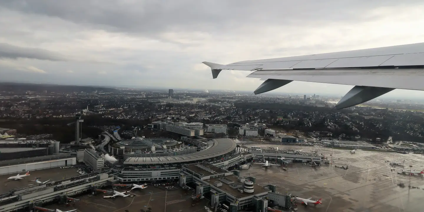 Düsseldorf, Germany – March 01, 2017: photography showing the cityscape of Düsseldorf from the sky. The photography was taken during take off from the inside of a commercial airplane that just took off from Düsseldorf international aeroport to go to Geneva airport in Switzerland.