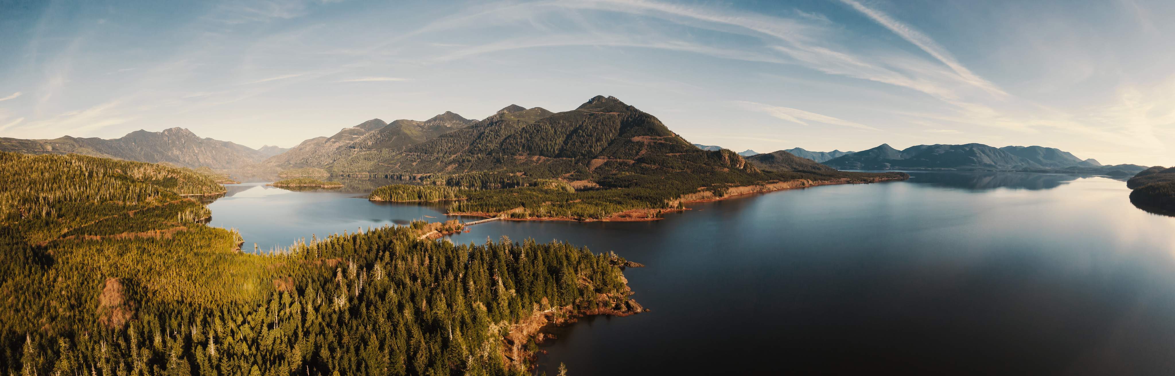 Beautiful Aerial Panoramic View of Kennedy Lake during a vibrant sunny day. Located on the West Coast of Vancouver Island near Tofino and Ucluelet, British Columbia, Canada.