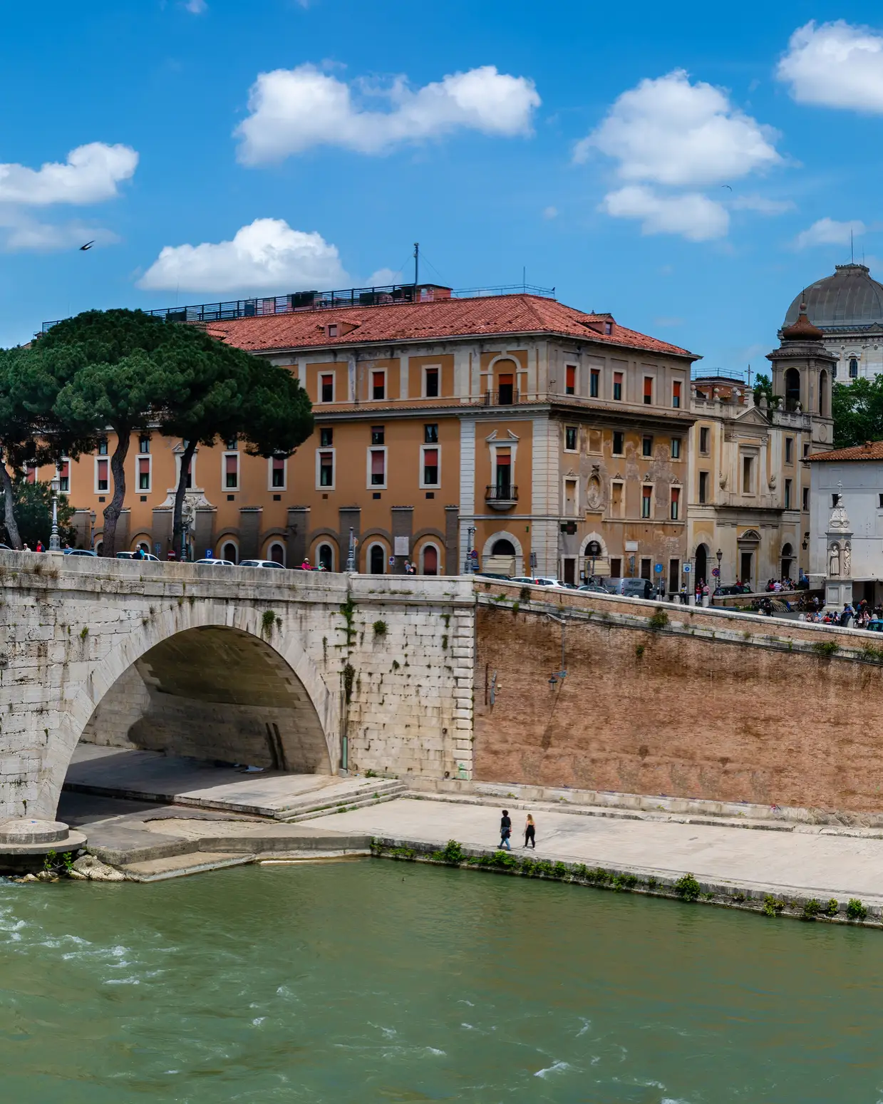 Panoramic view of the bridge over the Tiber with a view of the Trastevere district in Rome, Italy.