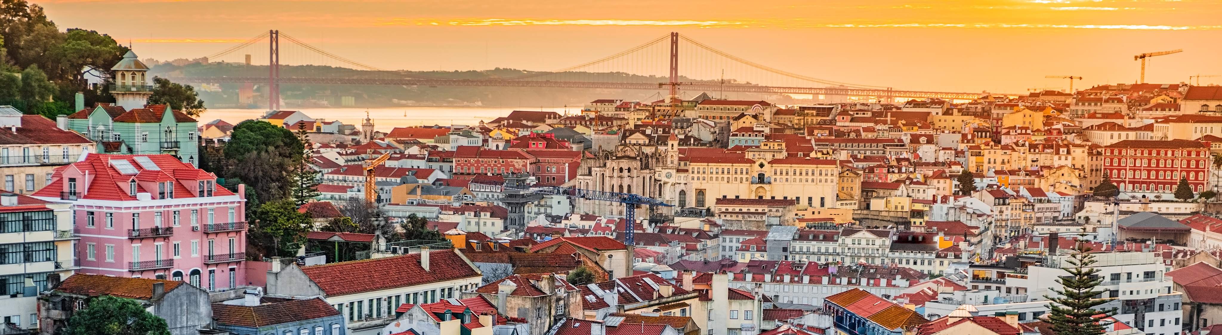 A view of the Alfama downtown and the 25 April Bridge, Lisbon, Portugal.