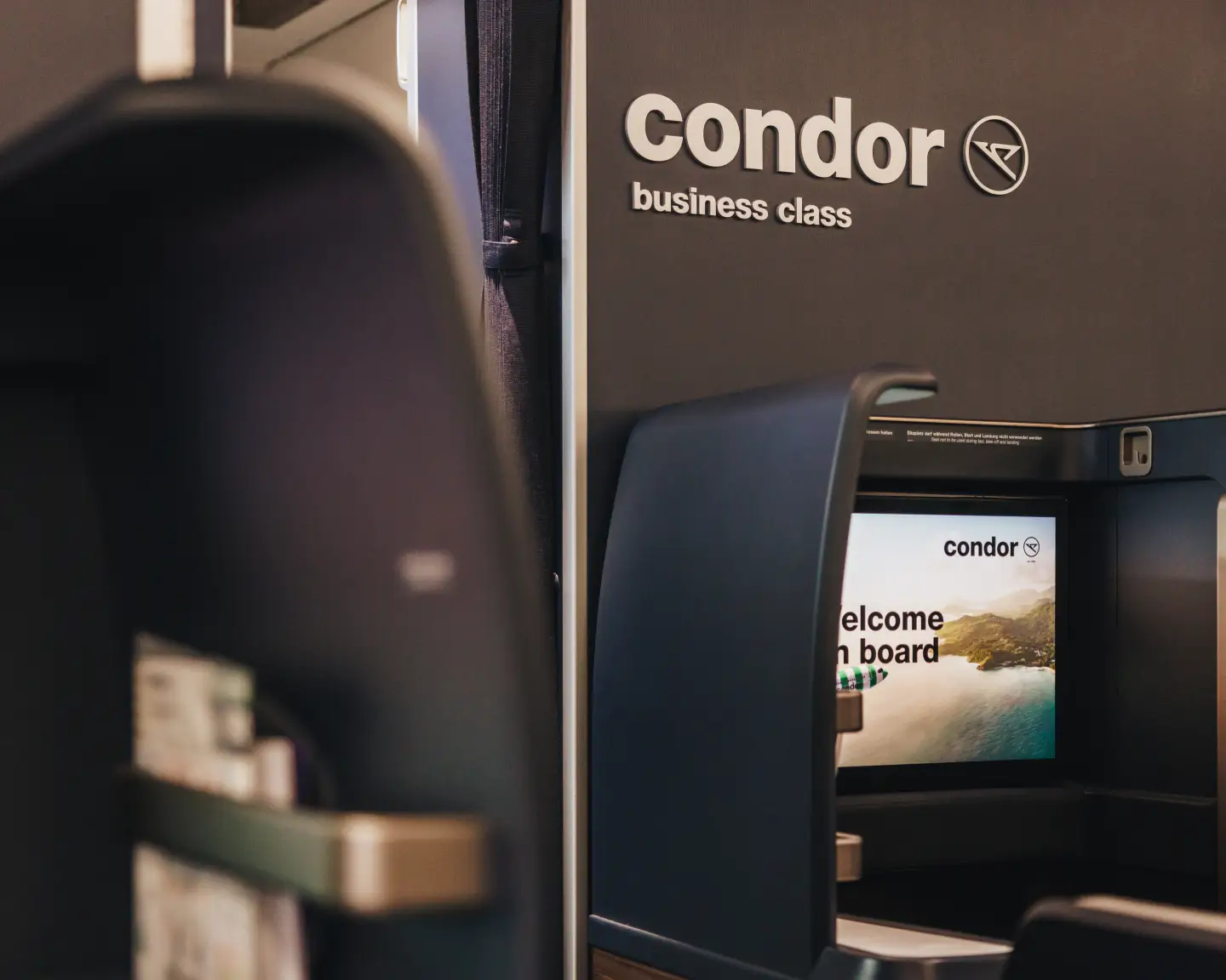 The wide personal screen on bord of Condor's Business Class