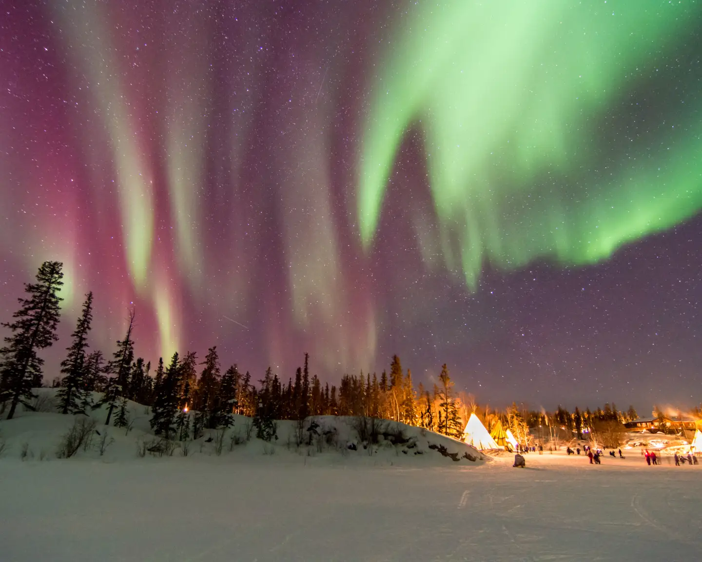 Aurora over scenes in Yellowknife