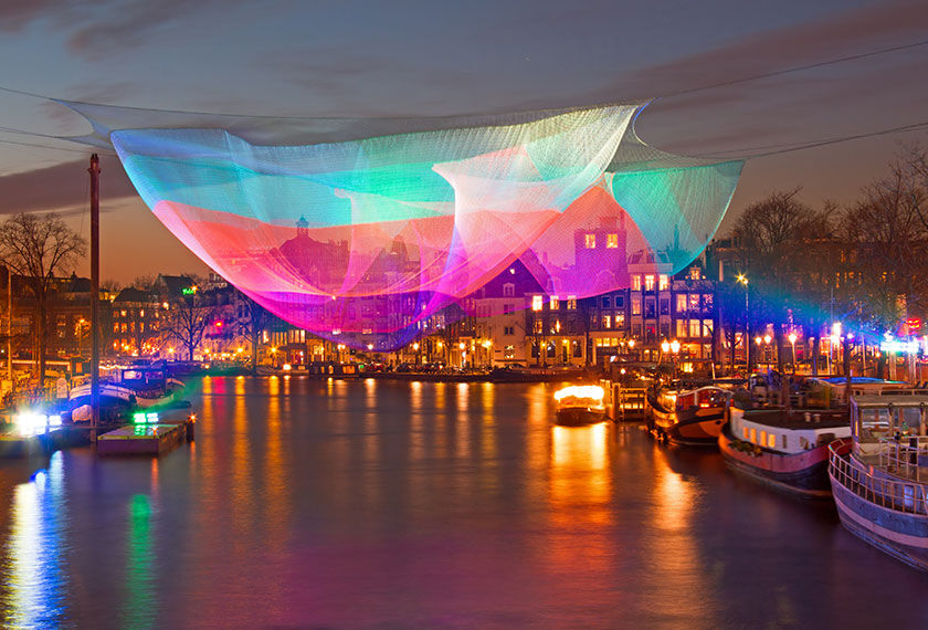 Light art installation over one of Amsterdam's canals during the Amsterdam Light Festival