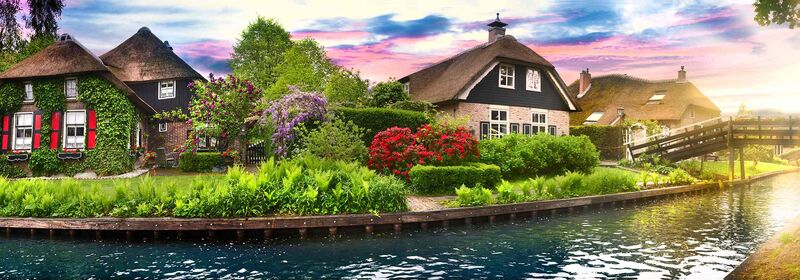 Veiw of Giethoorn, in the Netherlands, a quaint village by a canal, with traditional houses and lush greenery, reflects the serene beauty of a pastoral landscape under a soft, vibrant sky.