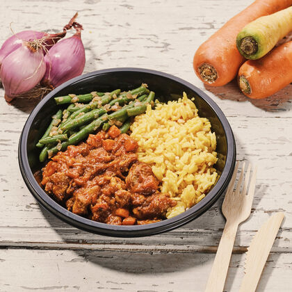 Chicken on turmeric basmati rice and green beans