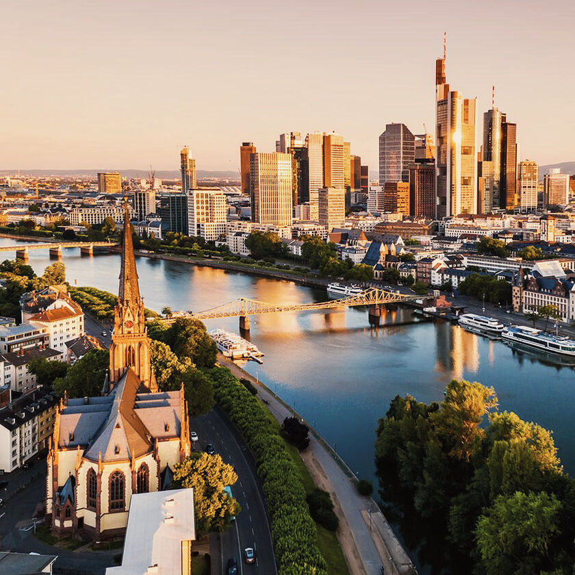 Frankfurt (FRA) Aerial view of Frankfurt skyline bathed in sunrise hues
