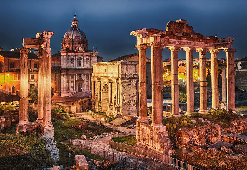 Flights to Rome View of the Forum Romanum in Rome at night